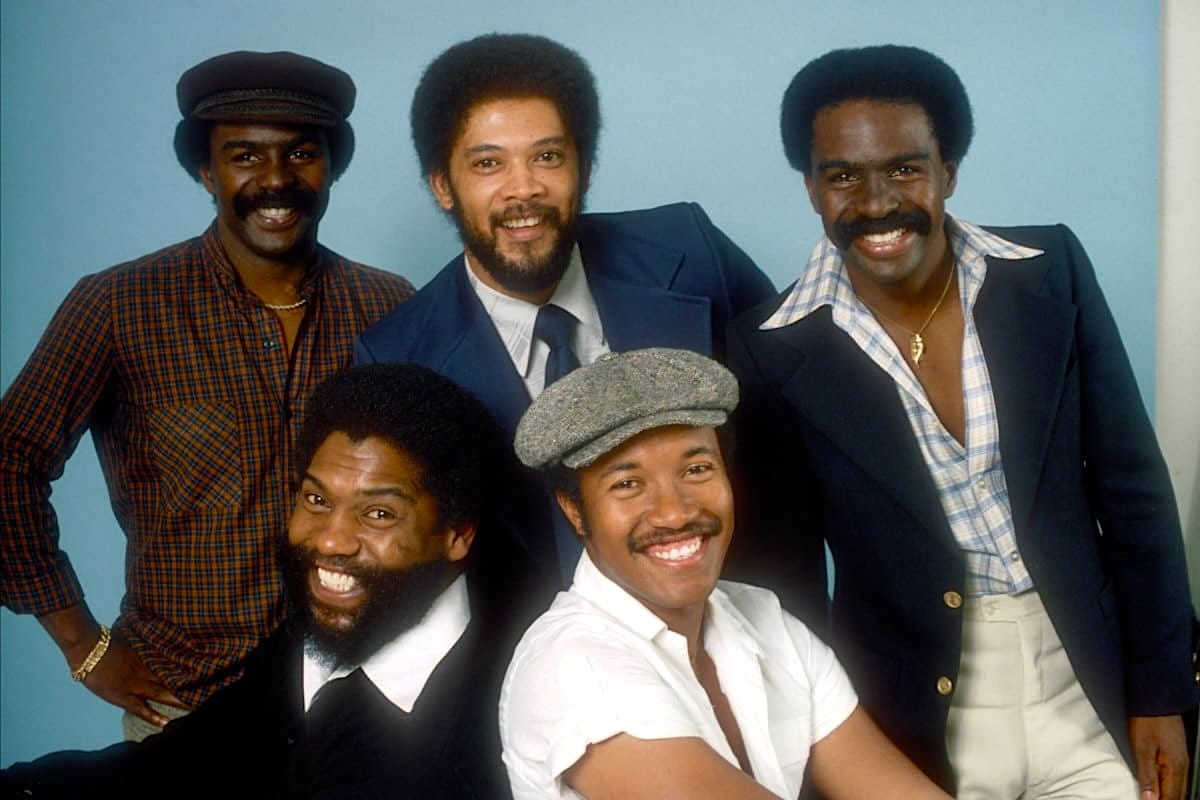 A photo of five members of the Whispers from the 1980s. 